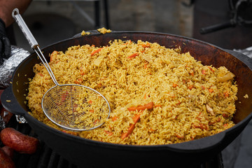 chan street food pilaf close up on street food festival