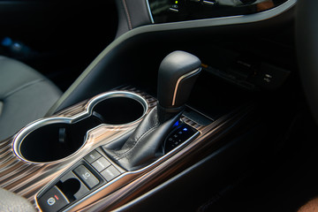 Modern centre console with gear shift, car  driving mode and auto break hole system