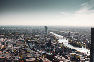 Fototapeta premium Panorama view of the city and the river Main from above on a morning sunny day. Frankfurt am Main, Germany