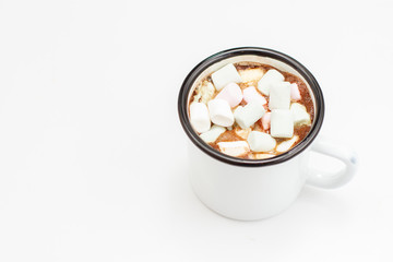 Hot cocoa with sweet marshmallow  on white table