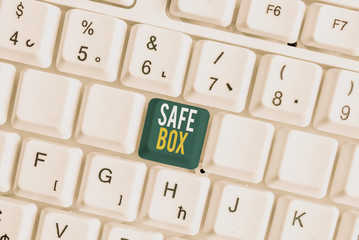 Handwriting text Safe Box. Conceptual photo A small structure where you can keep important or valuable things White pc keyboard with empty note paper above white background key copy space