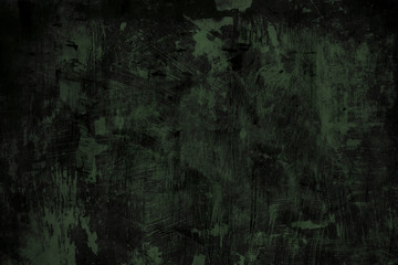 Dark green grungy wall background or texture