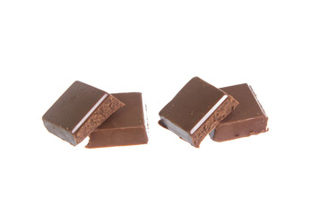 Broken milk chocolate bar set isolated on white background