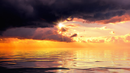 Naklejka na ściany i meble dramatic ocean sunset sky background