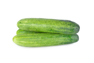 whole unpeeled fresh cucumber on white background