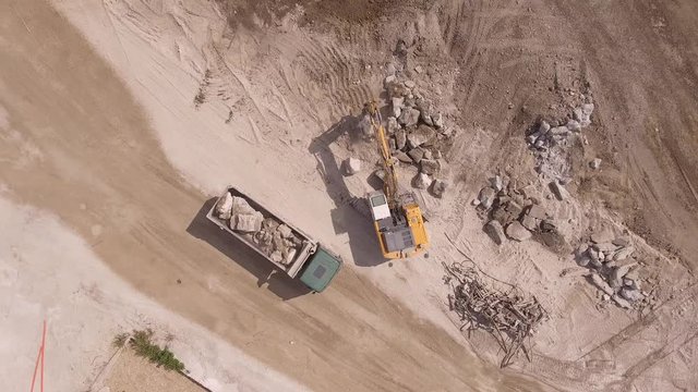 industrial building industry excavator and buldozer in construction site 4K aerial footage