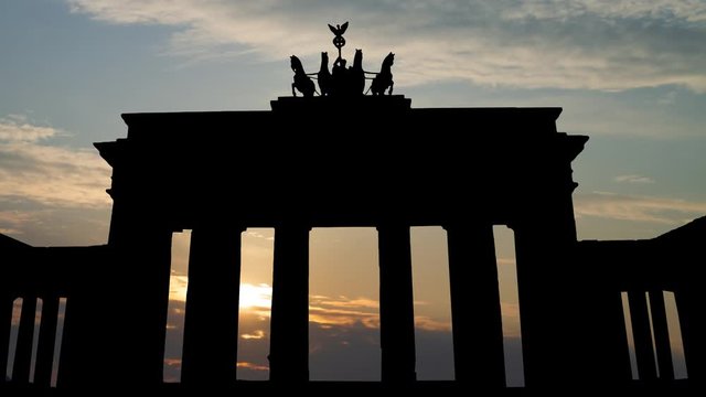 Berlin: Brandenburg Gate or Brandenburger Tor, Time Lapse at Sunrise with Colorful Clouds, Germany