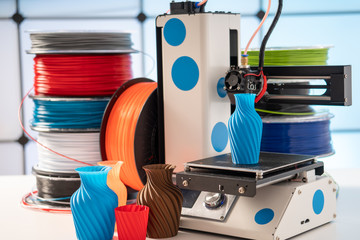 3D Printer Plastic filament for 3D printer and printed products in the interior of the design office