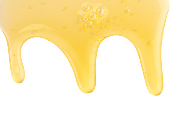 Texture of honey drips patterns isolated on white background