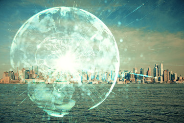 Double exposure of business theme hologram drawing and city veiw background. Concept of success.