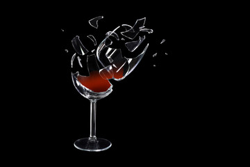 Broken wine glass on black background. Conceptual image. 