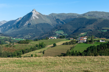 Fototapeta na wymiar Panorama of Goierri with Txindoki mountain as background, Basque Country, Spain