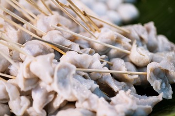 Meat ball , fish ball for grilled on wood stick ,Thai street food market