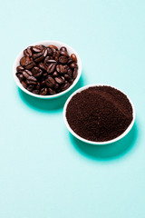 Coffee beans on blue background.