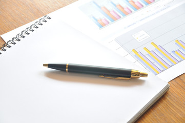 graph paper with business concept