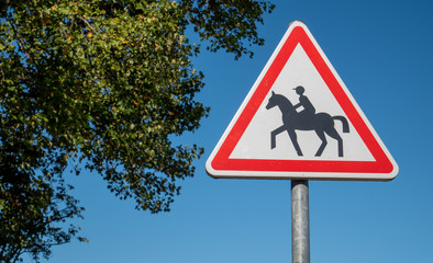french road sign with horse