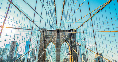 Beautiful Brooklyn Bridge with no people and a bright blue sky