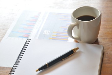 note paper and graph paper in business concept