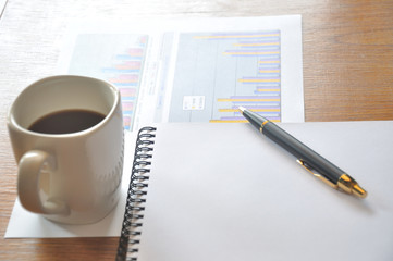 note paper and graph paper in business concept