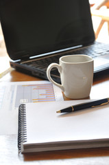 note paper and graph paper in business concept