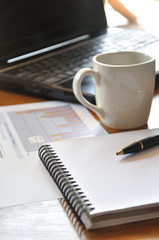 note paper and graph paper in business concept