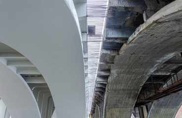 Construction of a concrete bridge from below.