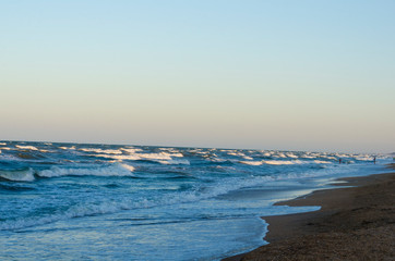 Photo of a sea beach with waves