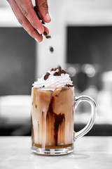 glass of coffee and chocolate on table
