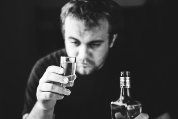 Alcoholism. alcohol addiction. drunk man. social issue. drunkard in depression