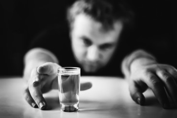 Alcoholism. alcohol addiction. drunk man. social issue. drunkard in depression