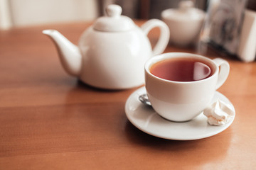 Hot tea in white cup