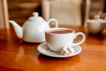 Fototapeta na wymiar Hot tea in white cup