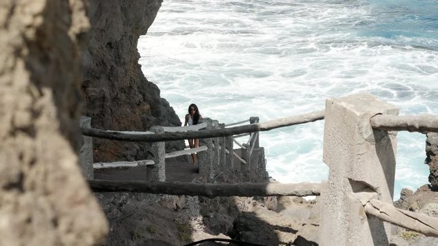 young active woman walks on the path