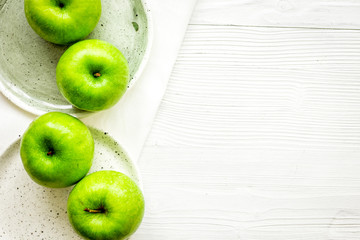 ripe green apples white table background top view space for text