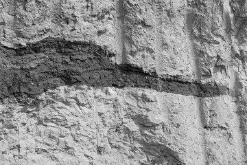 Texture of different layers of clay underground in a clay quarry. clay wall background close up