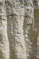 Texture of different layers of clay underground in a clay quarry. clay wall background close up