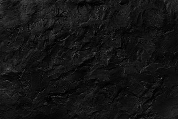 Seamless black rough concrete wall texture background.  dark cement wall.  grey plaster texture. blank for the designer