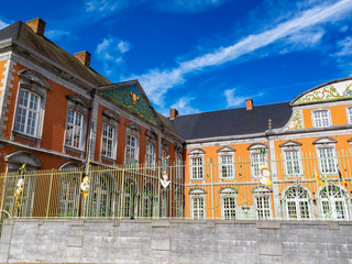 Obraz premium The building of the Abbey of Saint-Hubert, Abbey of St. Peter in the Ardennes in Saint-Hubert, Belgium on a sunny September day