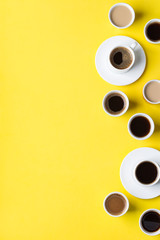 Creative flat lay with assortment of coffee cups