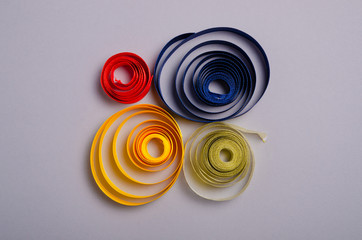Color ribbon on gray background, top view