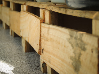 Wooden box on grey floor