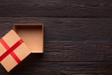 Empty gift box for new year present on wooden table