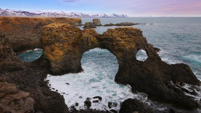 Natural rock gate in Arnarstapi, Snafellsnes peninsula, Iceland