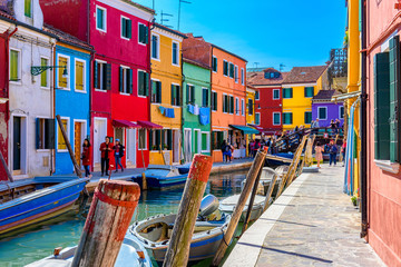 Street with colorful buildings in Burano island, Venice, Italy. Architecture and landmarks of Venice, Venice postcard