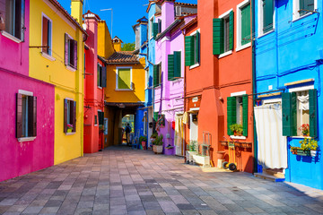 Street with colorful buildings in Burano island, Venice, Italy. Architecture and landmarks of...