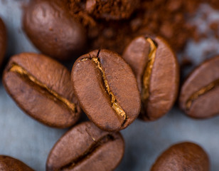 Close Up Of Coffee Beans On Coffee Powder
