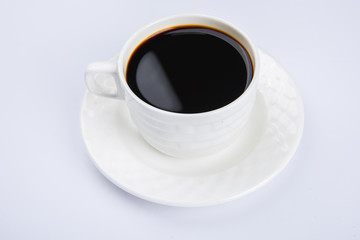 Cup Of Black Coffee On Grey Background