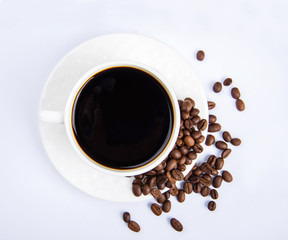 Cup Of Black Coffee With Roasted Coffee Beans On Grey Background