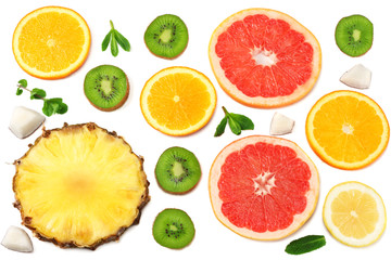 Fototapeta na wymiar slices of grapefruit, kiwi fruit, orange and pineapple isolated on white background top view healthy background