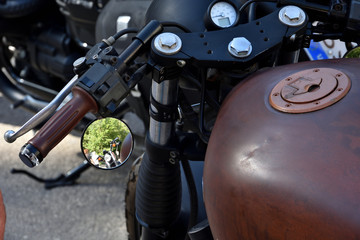 motorbike reflected in the mirror of another
